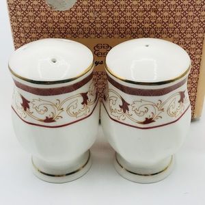 Vintage 1970’s Gold Coast 22k gold trim salt and pepper shakers in original box.